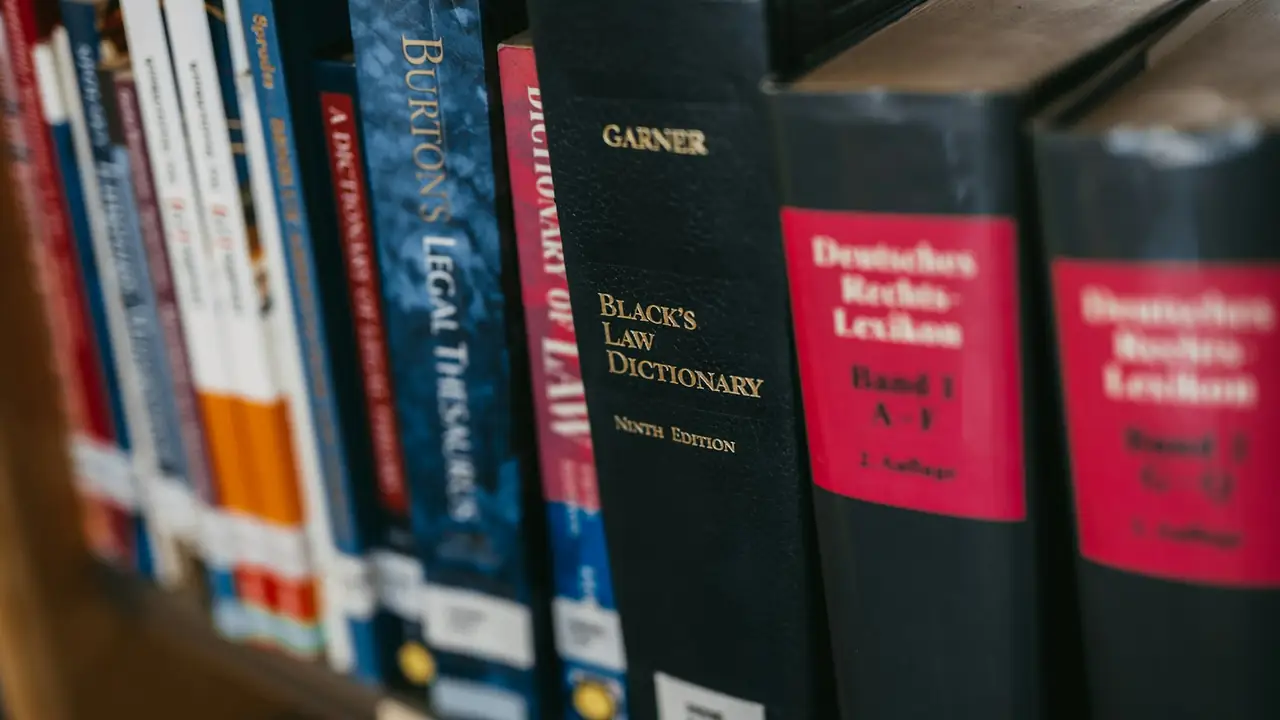 Law books lined up on a shelf