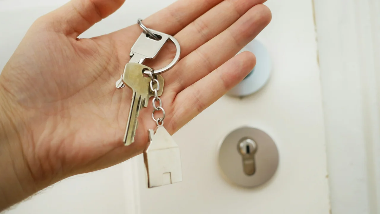 Keys resting in an open hand