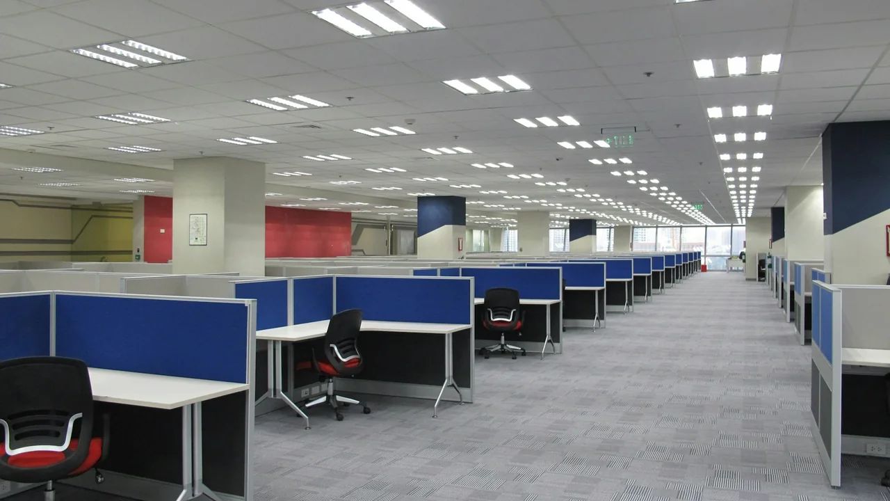 Empty office workstations and chairs